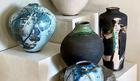 Ceramic Collection:  left to right Saggar Fired vessel by Tim Scull,  $450.00, Raku fired vessel (white) by John Warfel $375.00 , tall raku vessel by John Warfel $410.00, Turquoise collar Raku by John Warfel $260.00, Saggar fired vessel by Tim Scull $375.00